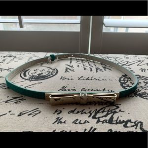 White House Black Market Green Belt with gold bow detail